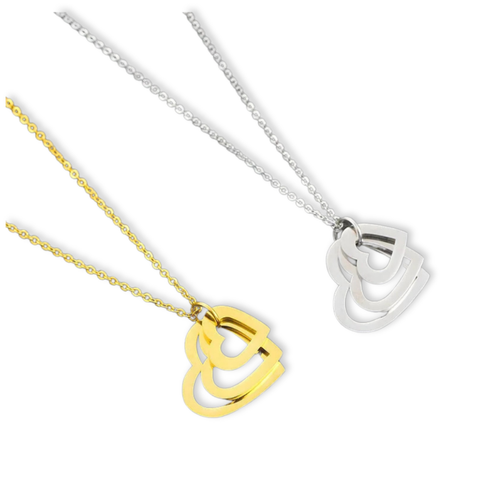Collar Mis Amores Vanytel con 2 dijes de corazón en acero inoxidable, disponible en dorado o plateado.