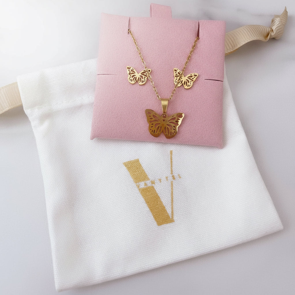 Set de collar y aretes de mariposa de Vanytel con empaque de lujo.