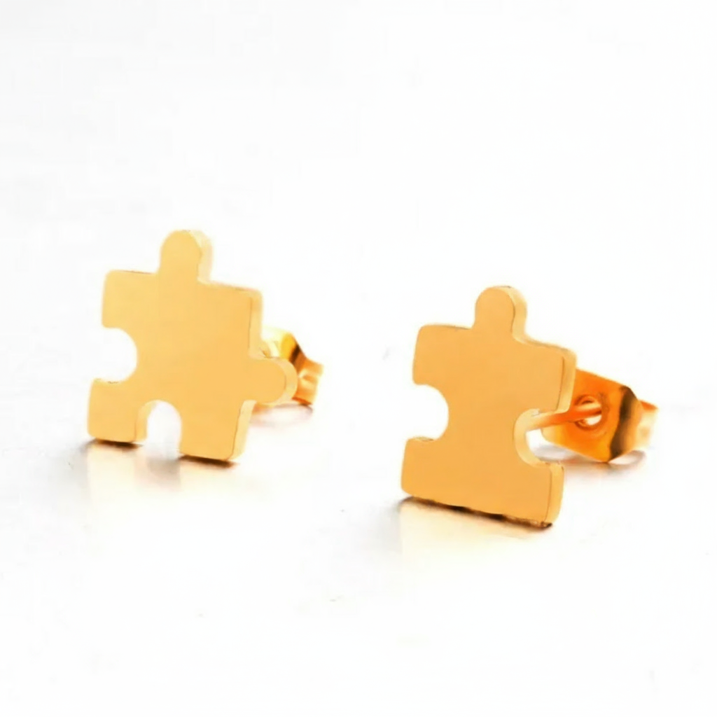Aretes de rompecabezas dorados tipo stud de acero inoxidable Vanytel.
