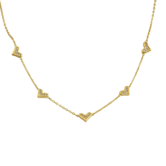 Collar de corazoncitos dorados en acero inoxidable con zirconias, joyería Vanytel.
