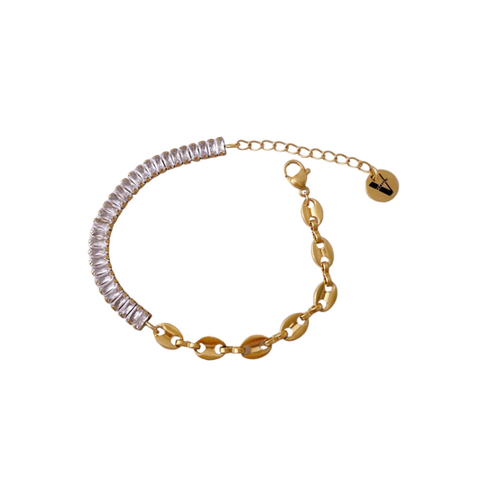 Pulsera Cristina de zirconia dorada en acero inoxidable, joyería elegante Vanytel.
